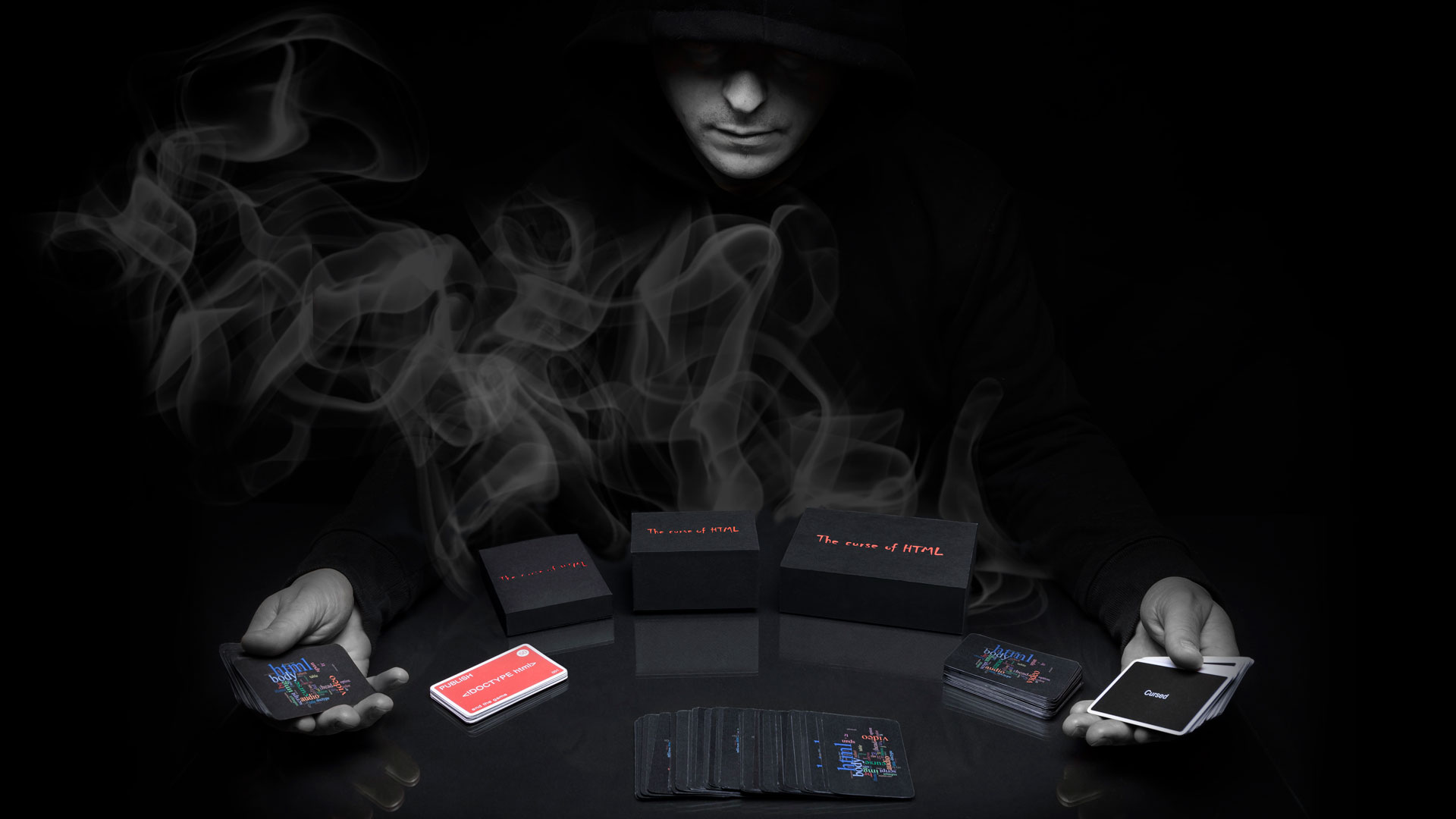 In this image we can see a sample of playing cards in the table.